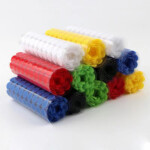 Adhesive backing hook and loop coins